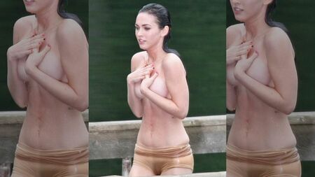 濡れて体にぴったりと張り付いたショートパンツから、ミーガン・フォックスの股間が透けて見える